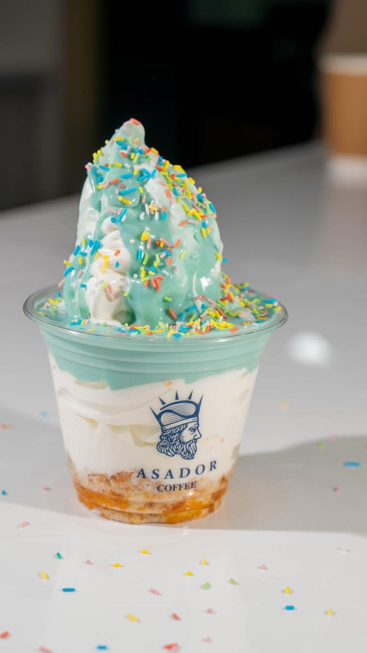 Bubble gum flavored soft ice cream with colorful sprinkles